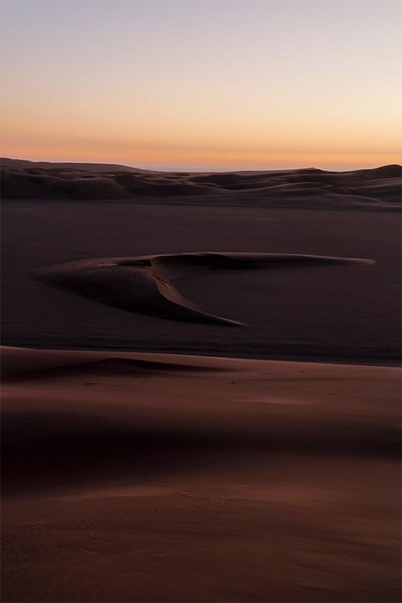 A Namibian desert scene at sunset, photographed by Brent Stirton on a Canon EOS R.