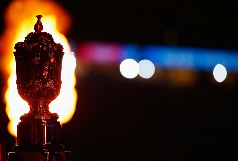 The Webb Ellis Cup is illuminated by flames during the opening ceremony before the England v Fiji match at Twickenham Stadium, Rugby World Cup 2015. 