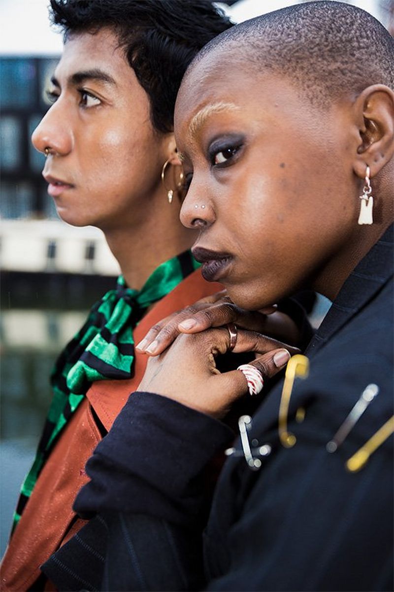 A male and female model pose outside. Photo by Rianna Gayle on a Canon EOS-1D X Mark II.