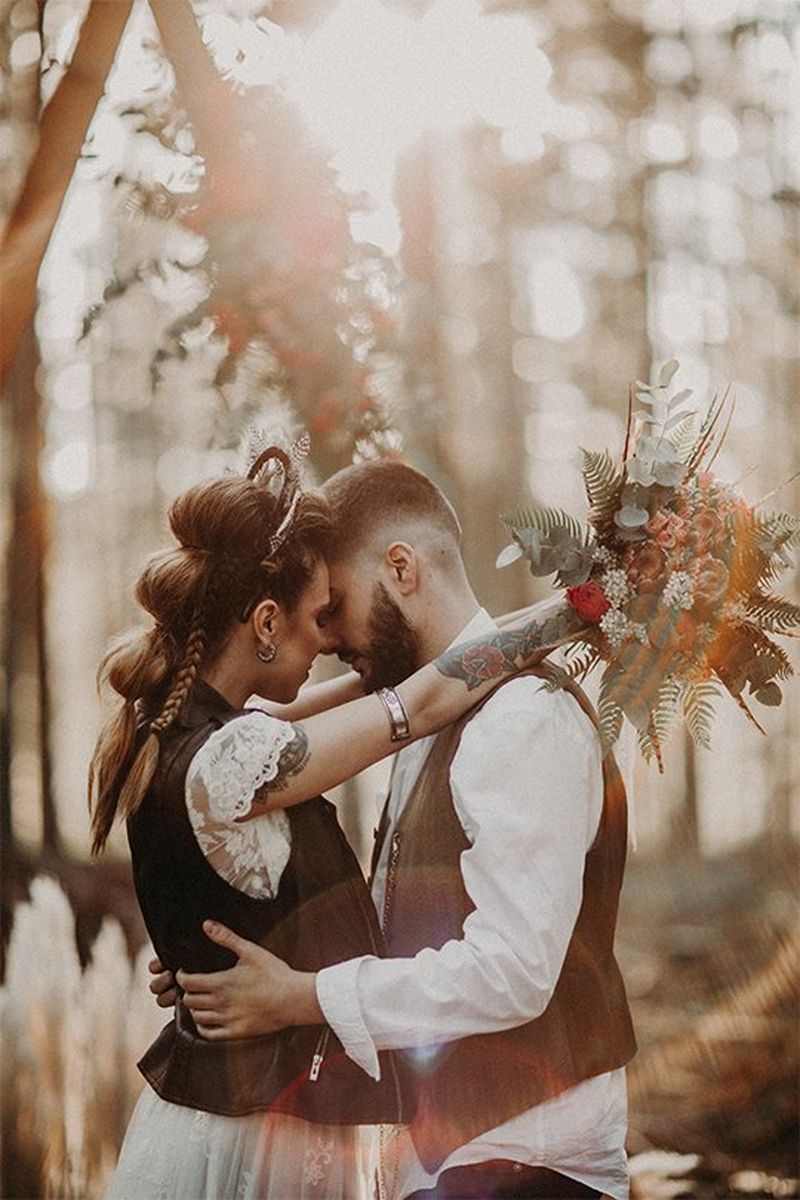 Bride and groom embrace in a woodland. Photo by Factoria182 on Canon EOS 5D Mark III.