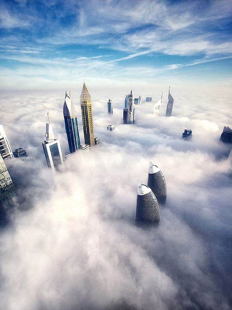 This photograph of blurred car lights was shot up against a window from one of the high rises in the residential district Dubai Marina.