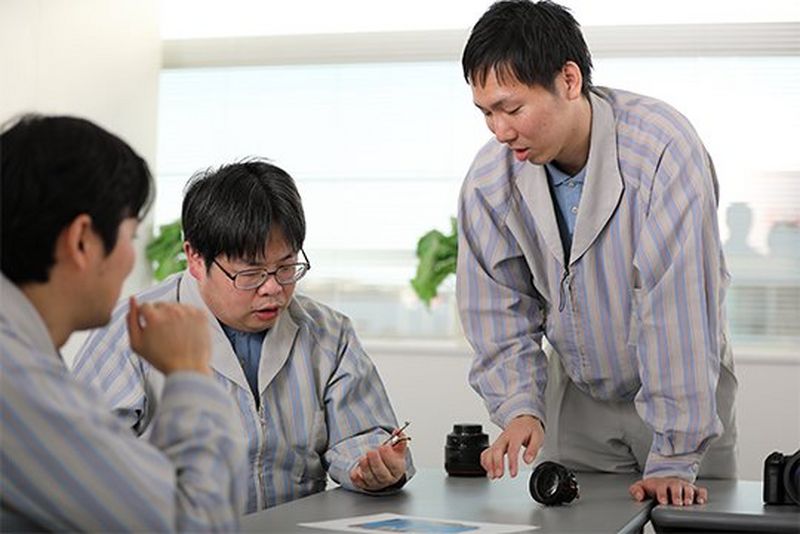 Three of the developers of the Canon RF 85mm F1.2L USM lens.