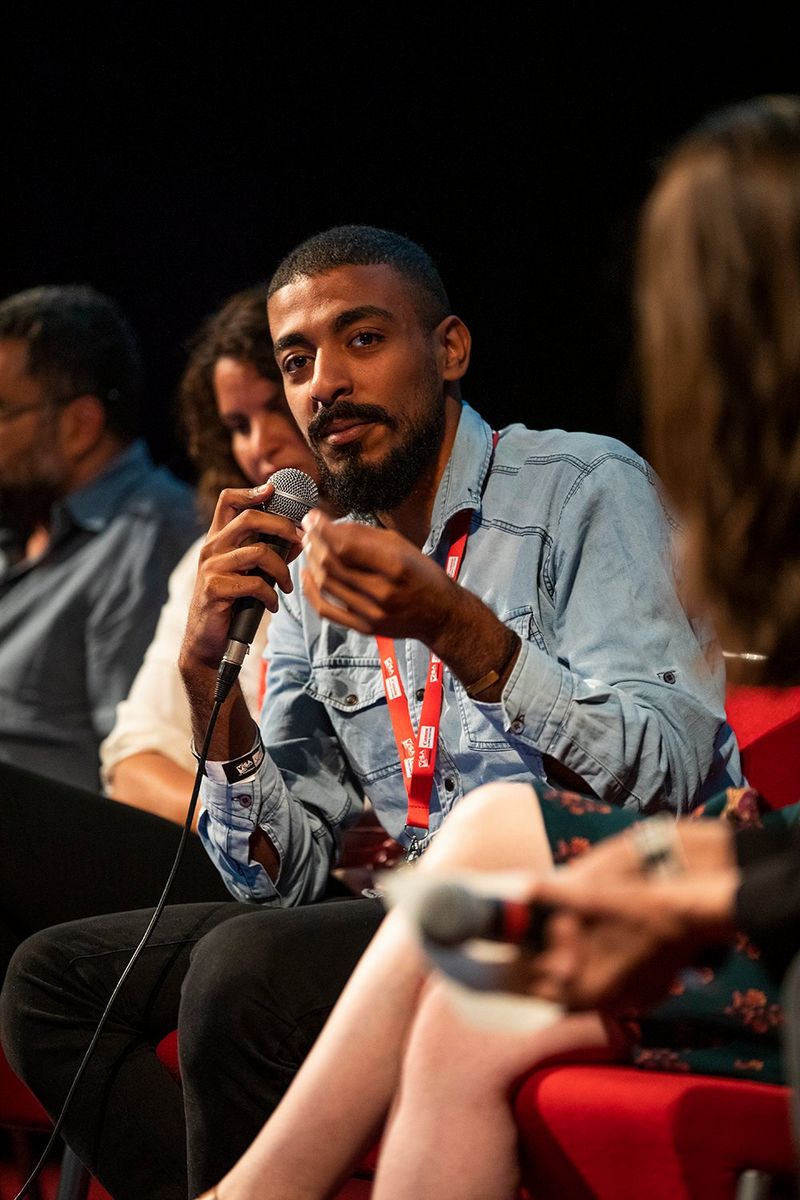 Photographer Daniel Obeid speaking to the panel.