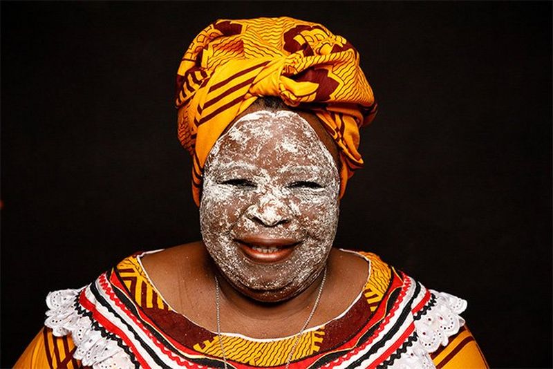 A woman from Mozambique in colourful traditional clothing.