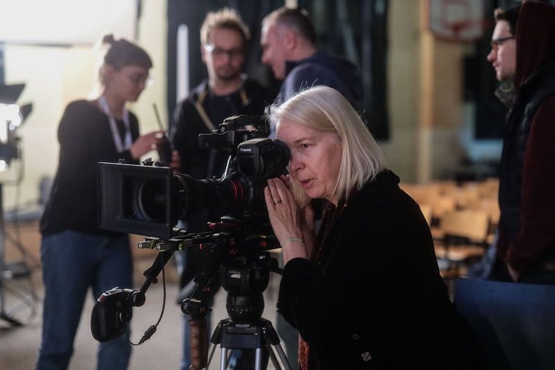 Cinematographer Claudia Raschke operating a video camera. 