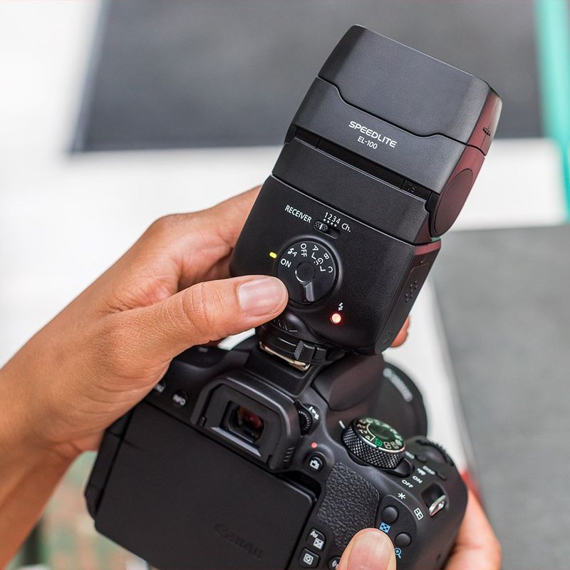 Canon Speedlite EL-100 mode dial in use