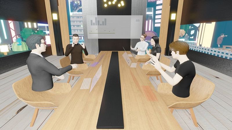 A digital illustration of five people working in the metaverse. They are floating upper bodies, with no legs, resting on light wood chairs around a light wood table. Around them, other meetings in other rooms are depicted, as though they can be seen through glass windows around the office.