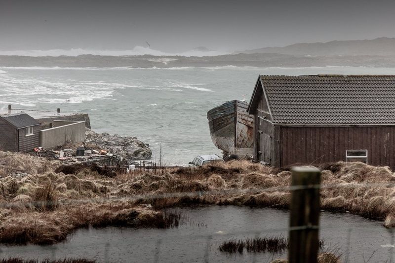 Fishing boat resting on a slipway in Portnahaven during winter weather on Islay captured by Clive Booth on the Canon EOS 5DS.