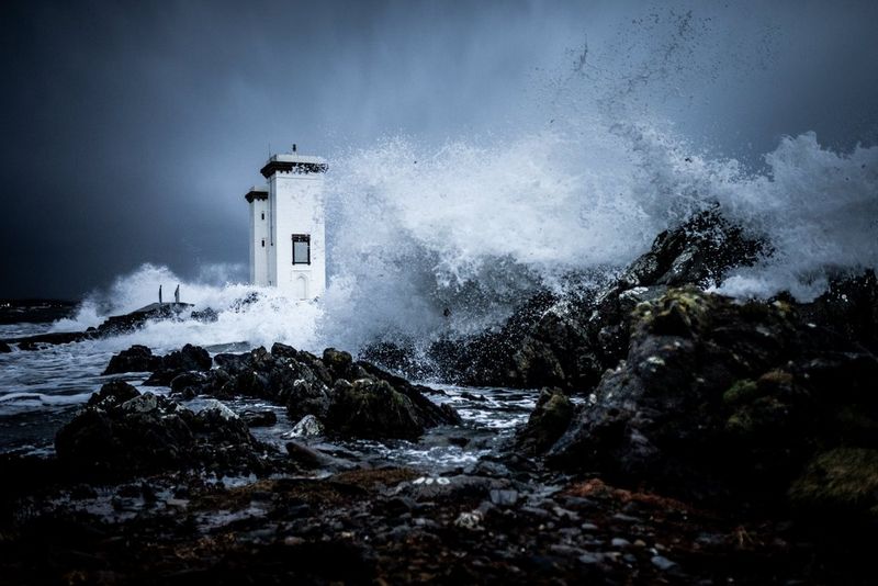Storm waves and winter gales surrounding Carraig Fhada Lighthouse near Port Ellen, Islay captured by Clive Booth on the Canon EOS-1D X.