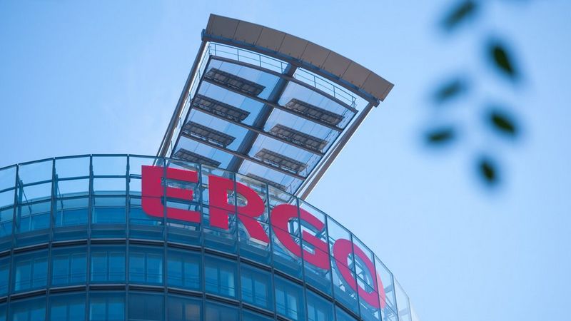 Top of the ERGO Group building shwoing a big red ERGO Sign