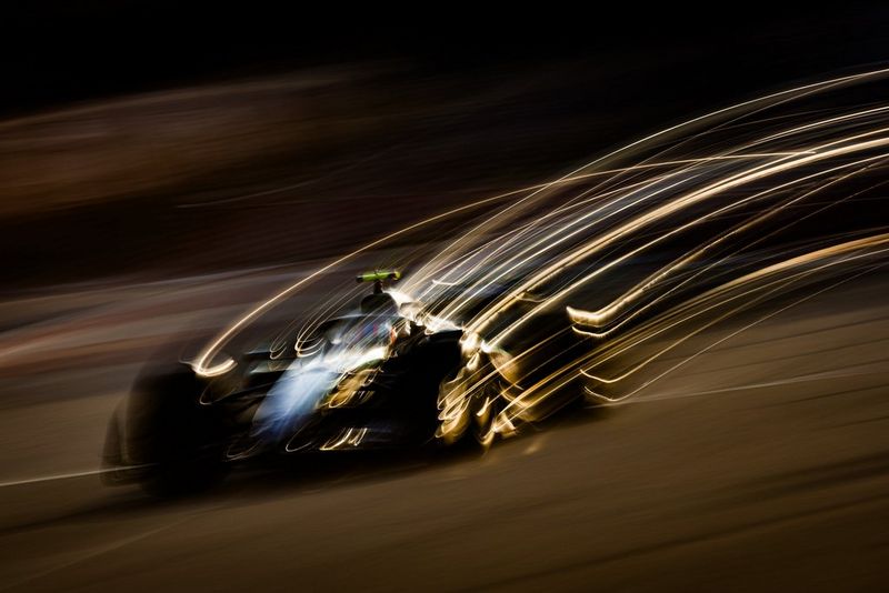 Abstract motion-blur image of a sports car by Florent Gooden, created using panning techniques on a Canon EOS R3.