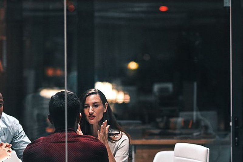 woman sitting a table