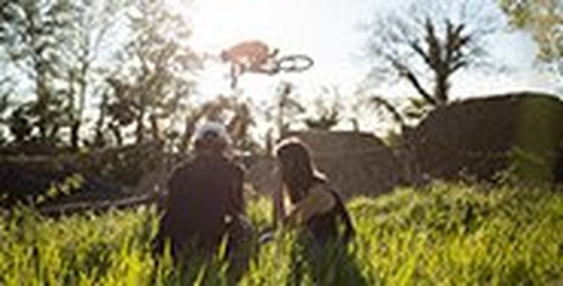 A Canadian player tackles an Irish player in a rugby match. Photo by Richard Heathcote.