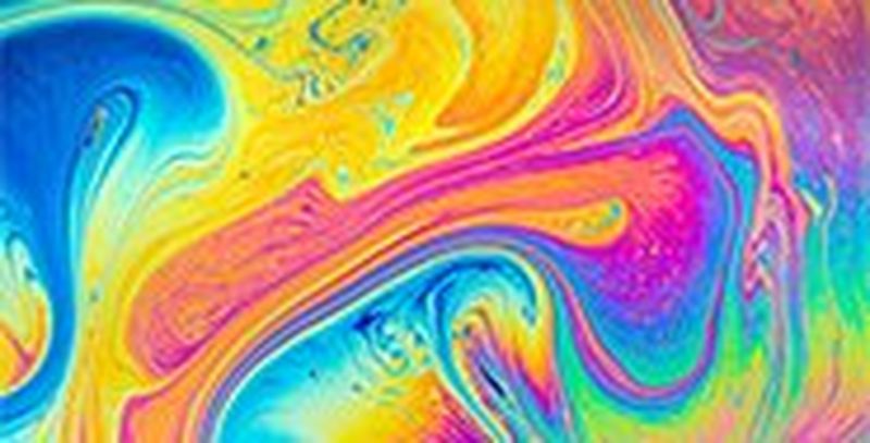 A macro shot of soap mixing with water.