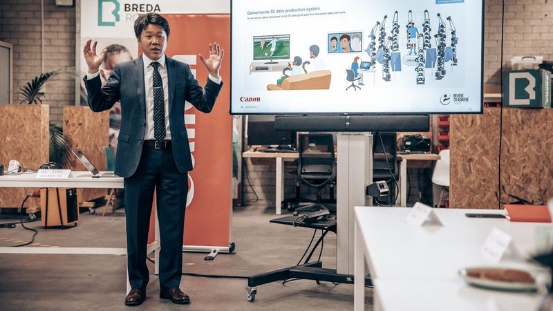 Canon Lead Software Engineer Akiyoshi Ishii presenting at Canon SDK Summit 2023.