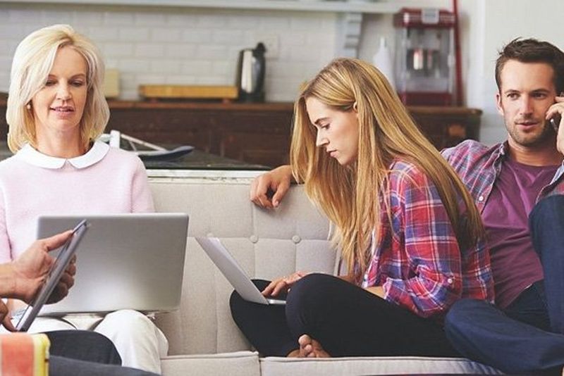 People behind laptops	