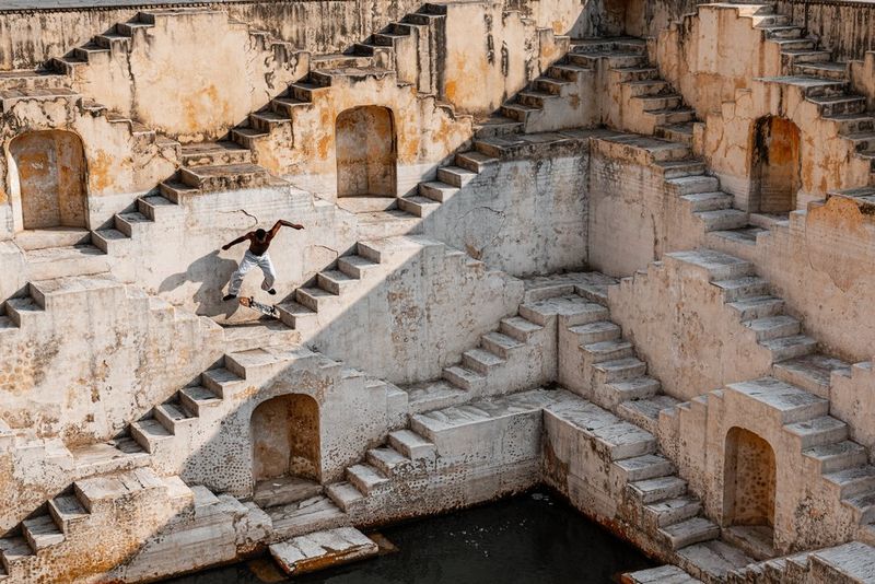 Action photograph of Indian skateboarder Yogesh performing a kickflip shot by Martin Bissig on the Canon EOS R5 Mark II.