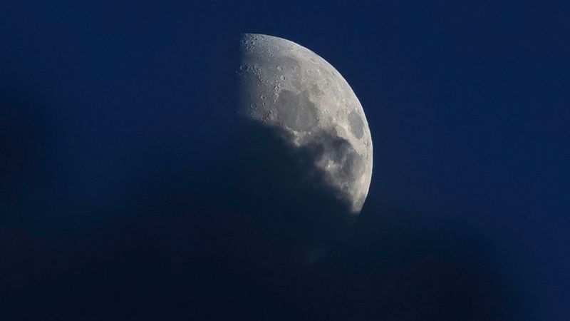 A close-up of the Moon, with only about a quarter of it visible, taken on a Canon EOS R8 by astrophotographer Mara Leite.