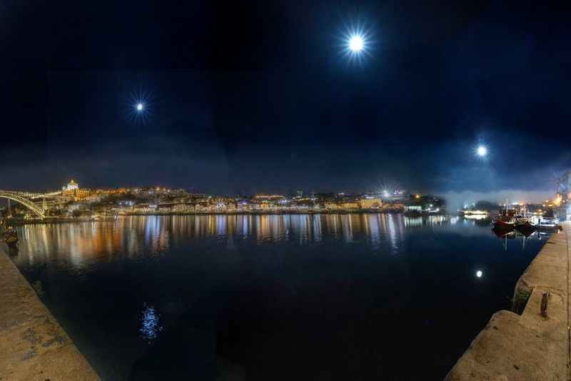 A first quarter moon visible in the sky, taken with a Canon RF 100-400mm F5.6-8 IS USM lens.