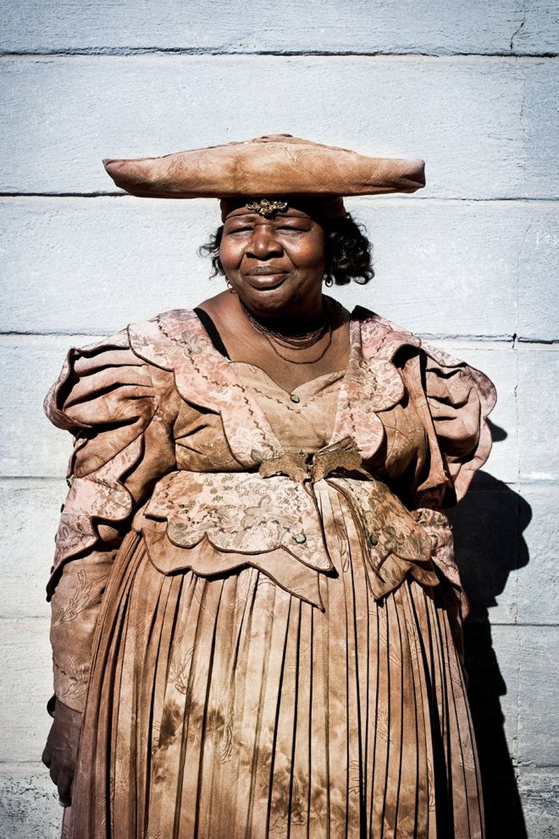 Portrait of Musiona Silpa Hantura of Namibia proudly posing in a Herero dress.