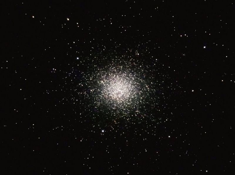 A spherical cluster of stars against a dark background.