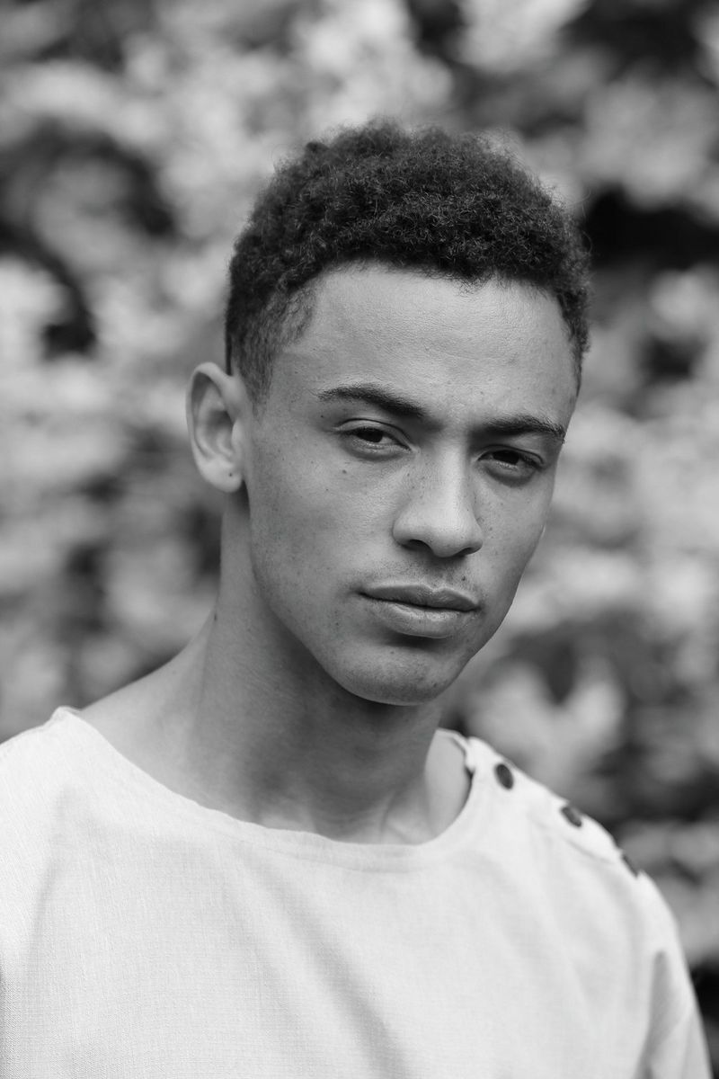 The same portrait but in monochrome with orange filter applied.
