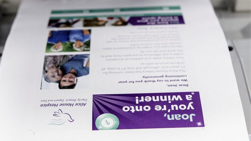 Personalised print coming off a printer