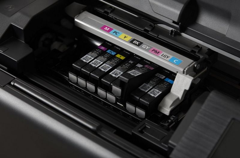 The eight ink cartridges in a Canon PIXMA PRO-200 printer.
