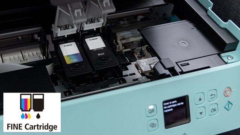 A Canon PIXMA printer, open at the top, reveals one black and one multi-colour FINE ink cartridge within.