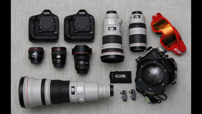 Canon Ambassador Alessandro Trovati's kitbag contents, including Canon cameras and lenses.
