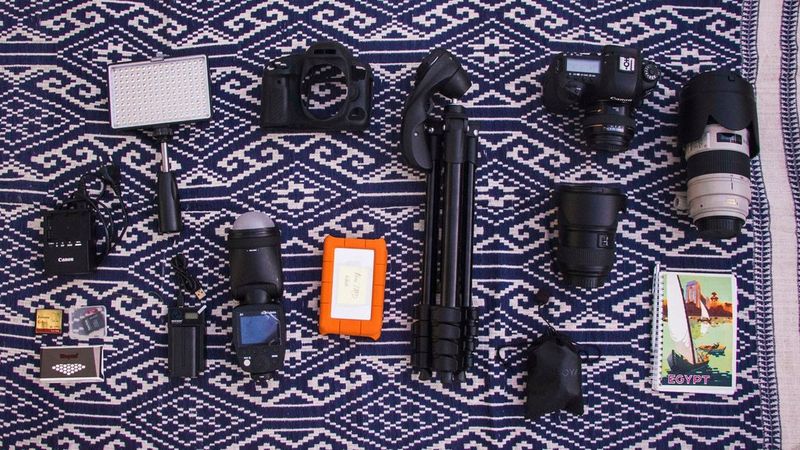 Aline Deschamps' kitbag containing Canon cameras and lenses.