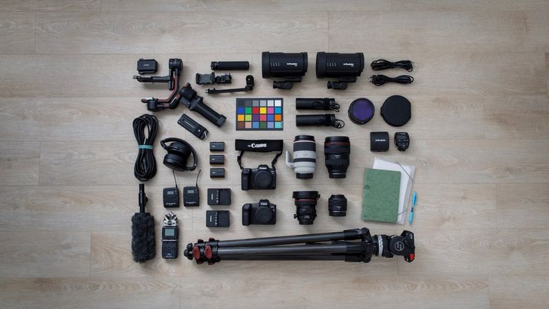 Dafna Tal's kitbag containing Canon cameras and lenses, as well as accessories. 
