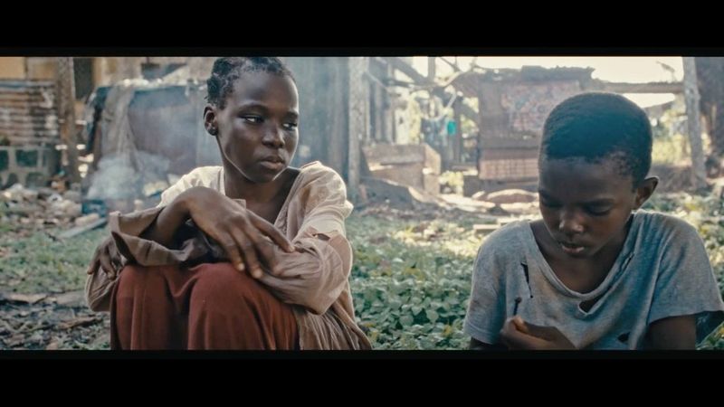 A still from Ba Ni, a 2022 film directed by Daniel Ehimen, showing two teenage beggars. © Daniel Ehimen