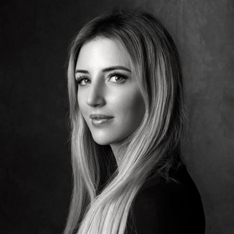 A black and white headshot of Canon Ambassador Donatella Nicolini taken by Guido Stazzoni.