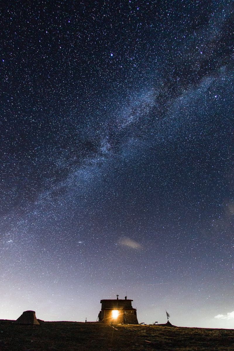 A photo of the Milky Way visible above Mount Olympus in Greece, taken with a long exposure and a fisheye lens by Canon Ambassador George Maschalidis.