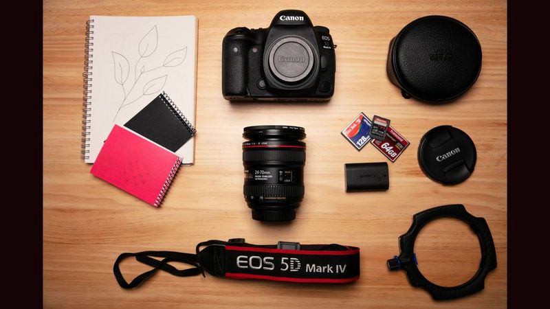 Canon Ambassador Iiris Sjöblad's kitbag containing Canon cameras, lenses and accessories.