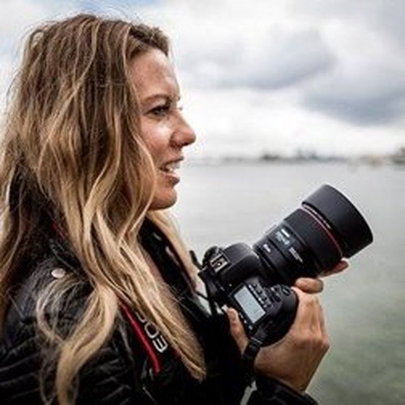 Canon Ambassador Ilvy Njiokiktjien with her Canon camera.