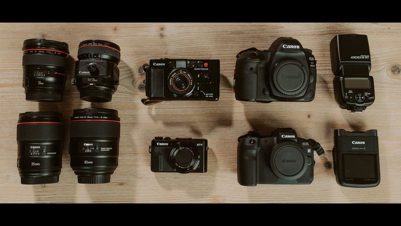 Julia Blumenthal and Gil Gropengießer's kitbag containing Canon cameras and lenses.