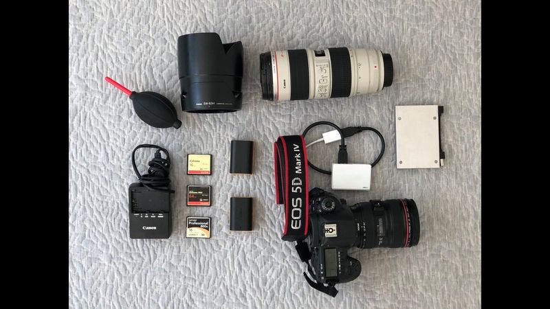 Julie Pike's kitbag containing a Canon camera and lens.