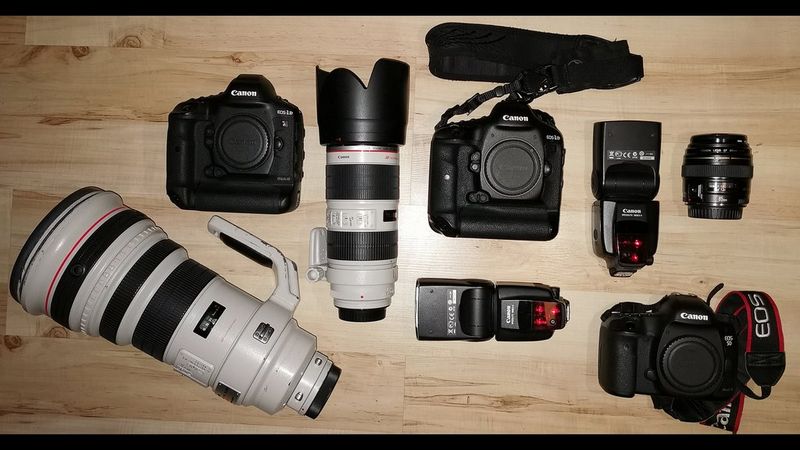 Łukasz Skwiot's kitbag containing Canon cameras, lenses and accessories.