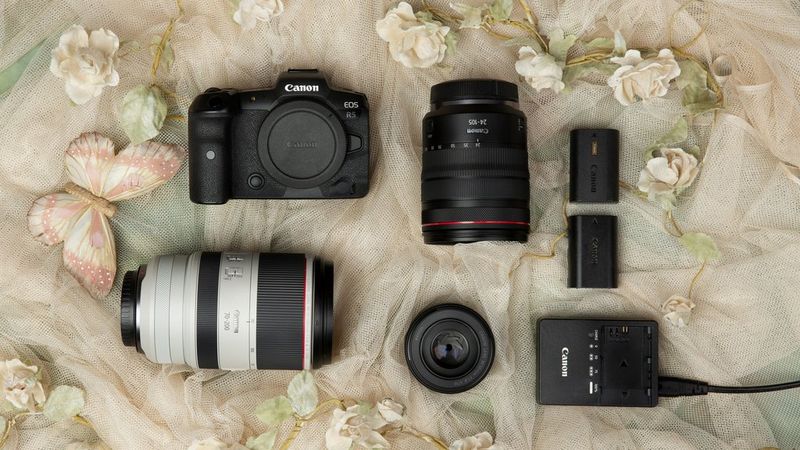 Martina Wärenfeldt's kitbag containing a Canon camera, lenses and accessories.