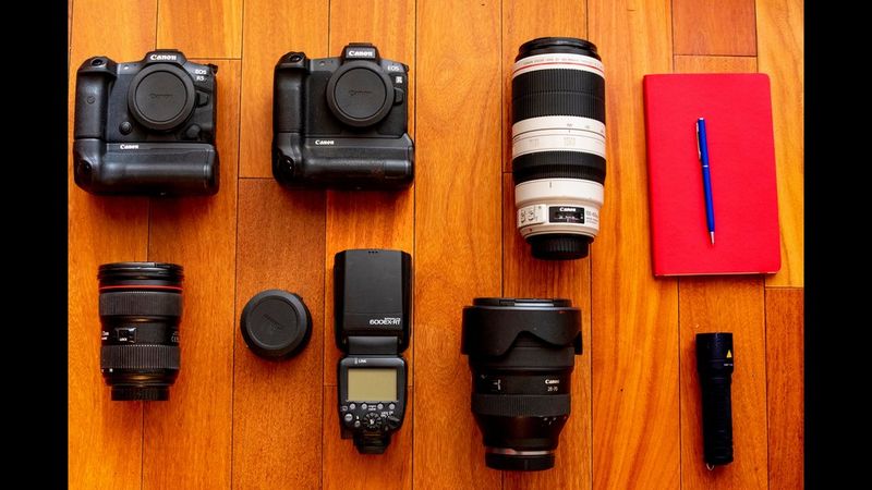 Pascal Maitre's kitbag containing Canon cameras, lenses and accessories. 