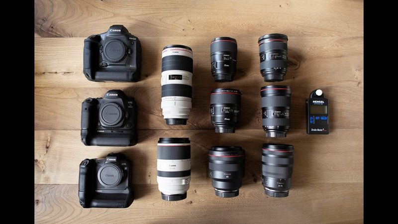 Sascha Hüttenhain's kitbag containing Canon cameras, lenses and a light metre.