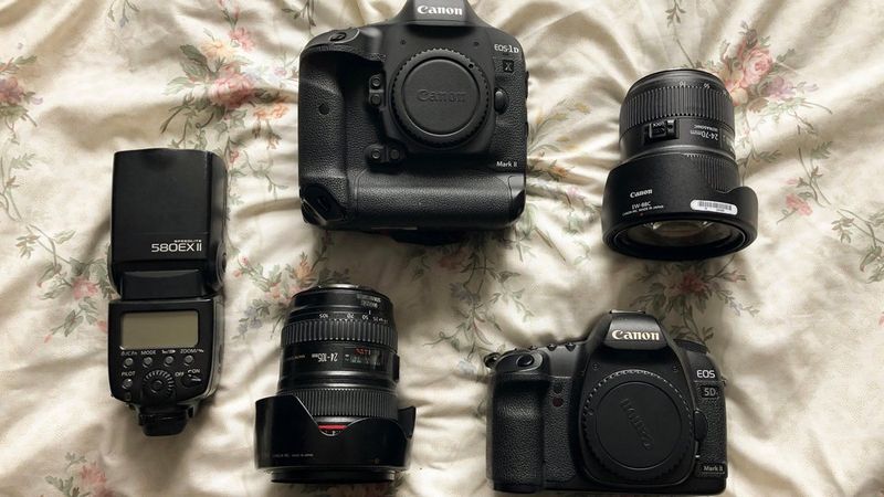 Wanda Martin's kitbag containing Canon cameras, lenses and a Speedlite.