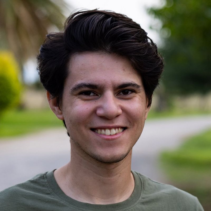 A headshot of photojournalist Ahmed Qabel.