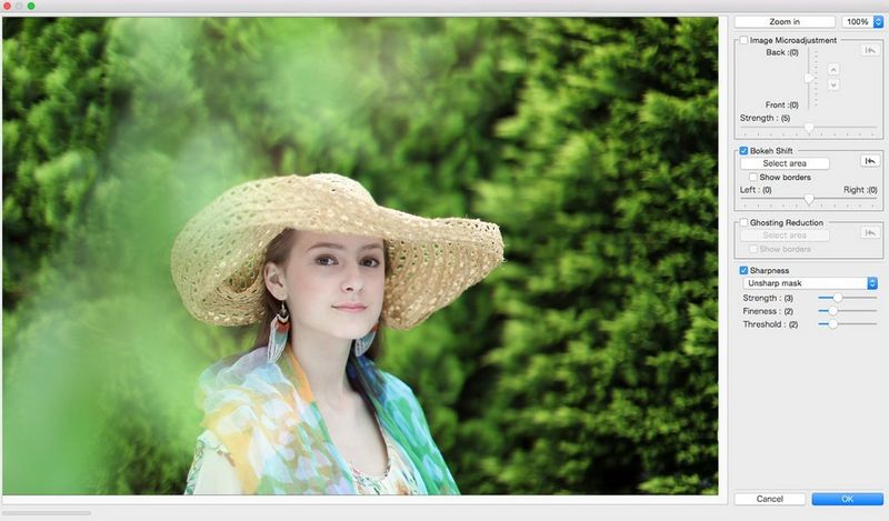 A photo of a woman wearing a straw hat in a garden, with the foreground bokeh being adjusted in DPP.