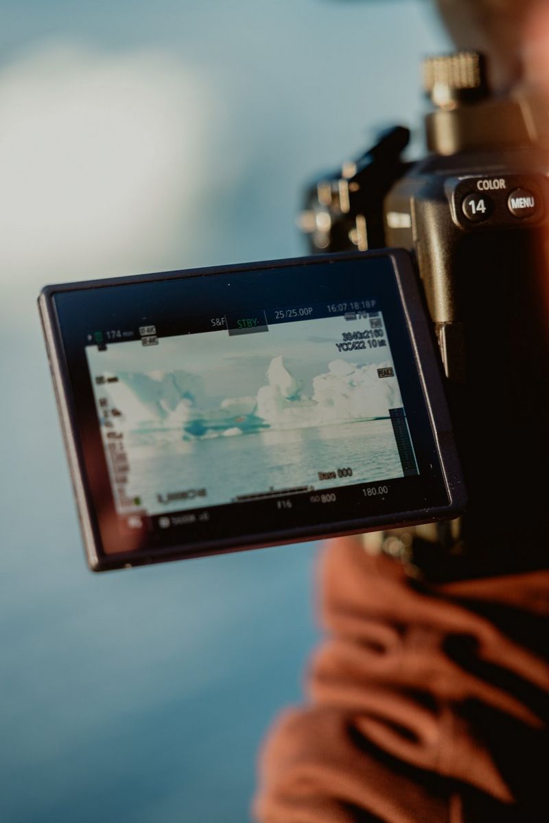 A Canon EOS C50 being used to film an icy Iceland view.