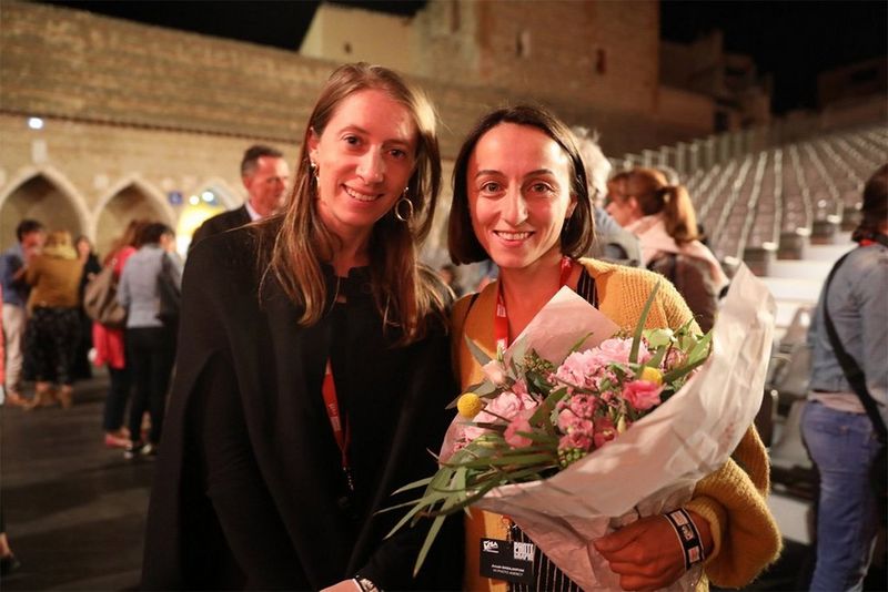  Canon Female Photojournalist Grant recipients Anush Babajanyan and Laura Morton pose a photo at the 2019 Visa pour l'Image festival in Perpignan, France.