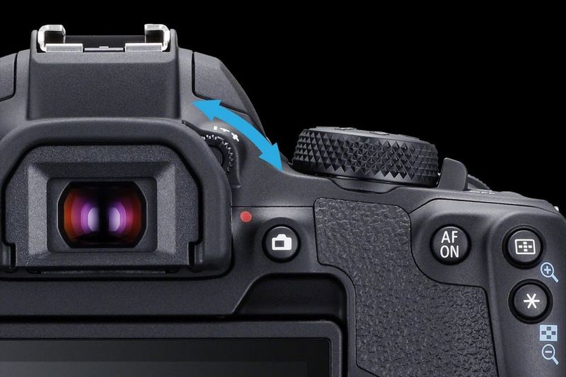 A close-up of the top of a Canon EOS 850D, with the dioptric adjustment dial visible at the top corner of the eyepiece.