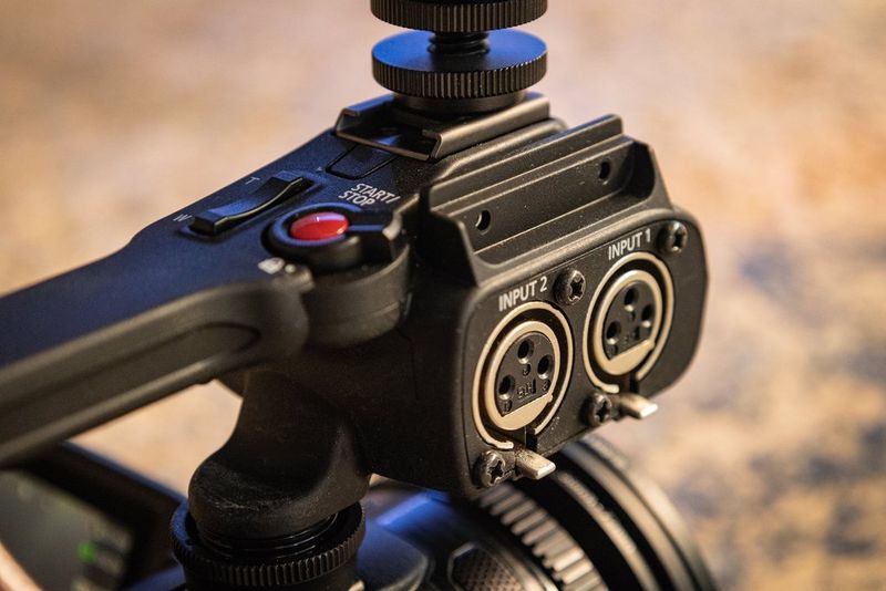 The XLR inputs on a Canon XA45 professional camcorder.